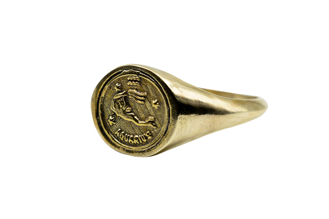 Vintage Brass Astrology Ring. Can be changed to Gold. This ring has Zodiac Aquarius. Handmade in a jewelry store in Brooklyn NYC