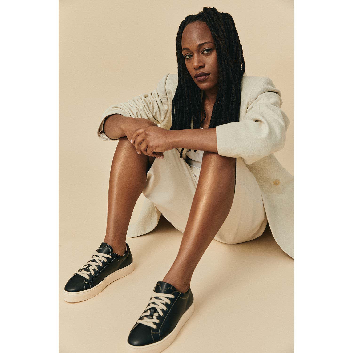 Sylven Mel Black/Oat vegan apple leather sneakers - worn by Bon Chrissy